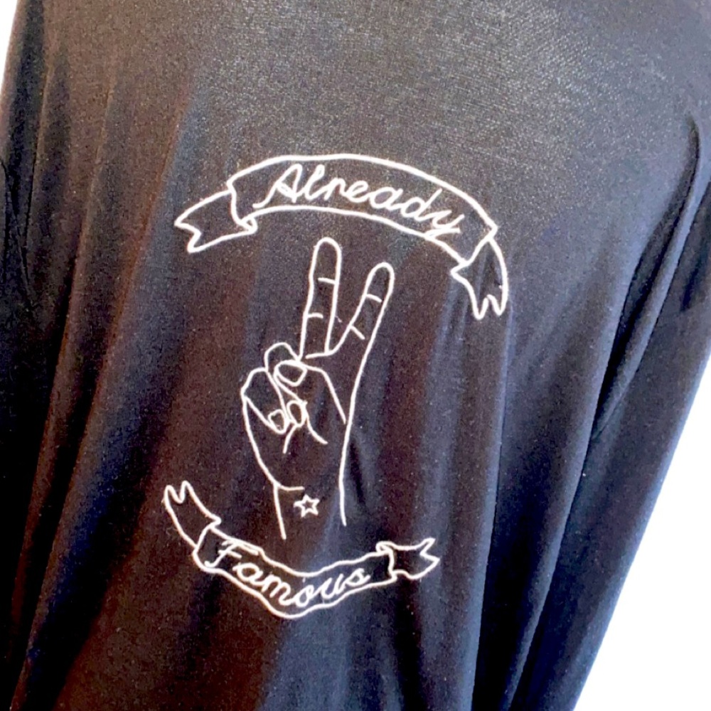 Woman’s hooded long sleeve top